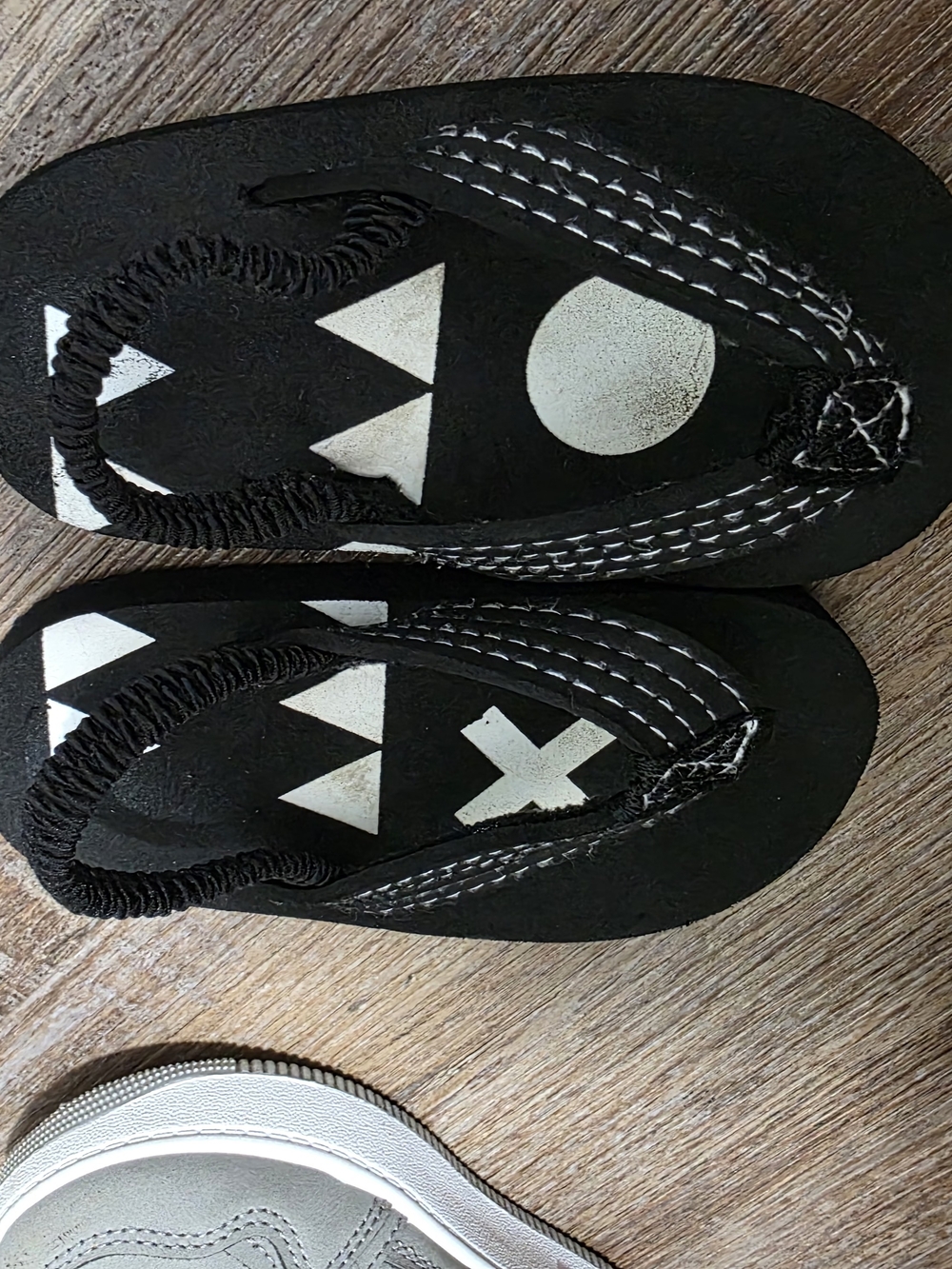 Kids Black Flip-Flop Sandals with White Graphic